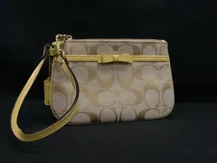 ■美品■ COACH コーチ シグネチャー キャンバス リボン アクセサリーポーチ マルチケース 小物入れ ベージュ系×イエロー系 DM2733