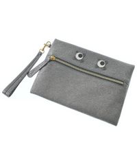 ほぼ未使用 ANYA HINDMARCH タッセル オフホワイト ポーチ - メルカリ