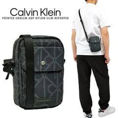 CALVIN KLEIN スリムレポータークロスボディバッグ PRINTED EMBLEM AOP NYLON SLIM REPORTER スマホ収納可 ショルダーバッグ 2WAYバッグ 鞄 軽量 コンパクト ギフト プレゼント 男女兼用 ユニセックス