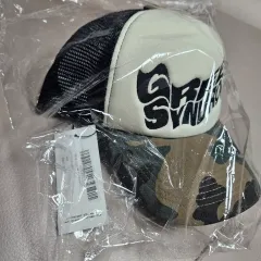 GREEN SYNDROME(グリーンシンドローム) ウィアード ロゴ メッシュ トラッカー キャップ カモ