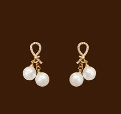 リボン パールイヤリング ゴールド 揺れる ダブルパール 上品 レディース ノンホールピアス 痛くない イヤリング 高級感 耳飾り入学式 卒業式