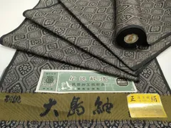 平和屋着物▼大島紬　反物　着尺　アンサンブル　伝統解織　繭美織　蜀江花文　繭美会謹製　証紙付き　逸品　未使用　DABC4191zy