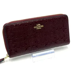 コーチ COACH シグネチャー エンボス 長財布 ラウンドファスナー お札入れ ゴールド金具 レディース ワインレッド ボルドー エナメルレザー