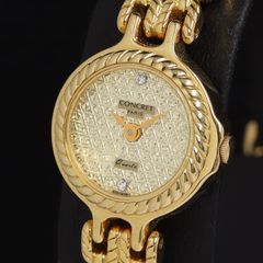 不動】COACH ゴールドカラー ラインストーンベゼル 腕時計 - メルカリ
