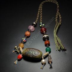 ゴールデンオブシディアン貔貅と、天珠のデザイン ネックレス ゴールデンオブシディアン貔貅と、天珠のデザイン ネックレス - メルカリ