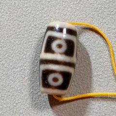 ②チベットビーズ 天然石 品名:ふるめかしい四眼天珠 - メルカリ