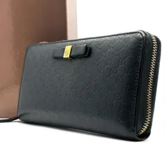 静寂に、リボンを。　GUCCI　長財布 ラウンドファスナー マイクロシマ 12カード リボン インターロッキング　黒