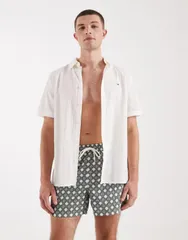 エイソス メンズ 水着 ハーフパンツ・ショーツ プリント ASOS DESIGN swimsuit in short length with green geo print GREEN グリーン