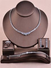 Ladies' Jewelry Set: 4-piece Zirconia Jewelry Set for Women, Perfect for Bridal Wedding Party Gifts, Includes Necklace, Earrings, Bracelet, Ring, and Platinum-Colored Rhinestone Accessories.