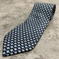 【Salvatore Ferragamo】サルヴァトーレフェラガモ 小紋柄ネクタイ ガンチーニロゴ　総ロゴ　ドット柄ネクタイ シルク100% メンズ イタリア製 ネイビー 紺色 総柄ネクタイ ブランドネクタイ ビジネスネクタ 幾何学モチーフ クラシックデザイン