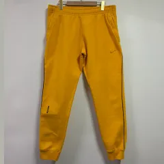 XL NIKE x ドレイク Nocta フリース パンツ ユニバーシティ GOLD