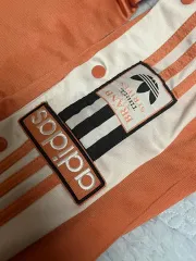 adidas(アディダス) ADIBREAK(アディブレーク) オレンジ xs