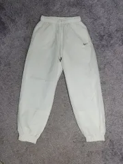 NIKE(ナイキ) ズボン ミッドライズ ウーブン ジョガー パンツ 白 s