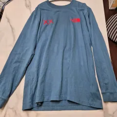 THE NORTH FACE(ザノースフェイス) x カウズ 長袖 ロングスリーブ マラッドブルー （ L ）