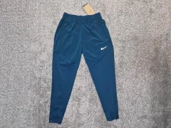 新品 NIKE ウィメンズ ドライフィット スウッシュ RUN パンツ S(65)