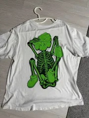 UNIQLO(ユニクロ) x カウズ スケルトン 半袖 Tシャツ （ L ）