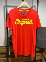 adidas(アディダス) オレンジ Tシャツ