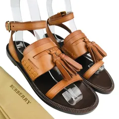 新品未使用★BURBERRY★バーバリー【Bethany】レディース レザー ブランドロゴ刻印 タッセル付き アンクルストラップ フラット サンダル (36/23㎝相当) イタリア製 ブランドサンダル レディースサンダル 春夏靴 カジュアルのサムネイル