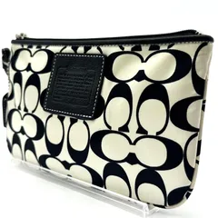 COACH コーチ ポーチ シグネチャー ナイロン ブラック ホワイト モノトーン リストレット付き 小物入れ 化粧ポーチ レディース 人気 定番 美品 ロゴ プレート付き 正規品 人気 定番 おしゃれ 軽量 コンパクト 旅行用 ギフトおすすめ