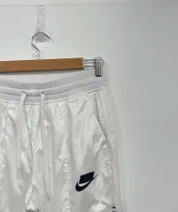 NIKE(ナイキ) nsw スポーツウェア ペイズリー ウエストゴム ウーブン トラック パンツ