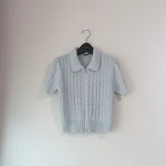 羊ジップアップ ケーブル半袖ニット