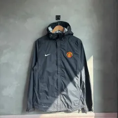 Nike(ナイキ） MANCHESTER UNITED FC(マンチェスター・ユナイテッドFC) ストームフィット ウインドブレーカー チャコールグレー グレー