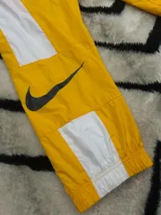 S NIKE ウィメンズ ウーブン ジョガー パンツ/L イエロー