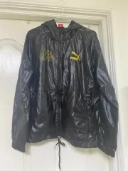 プーマ ブラック ウィンドブレーカー アウター