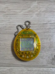 新種発見‼︎たまごっちBANDAI スケルトンイエロー ジャンク