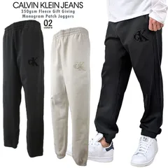 Calvin Klein Jeans フリースモノグラムロゴジョガーパンツ 希少 350gsm Fleece Gift Giving Monogram Patch Joggers スウェットパンツ イージーパンツ ギフト ユニセックス