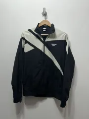 リーボック ブラック/アイボリー ウィンドブレーカー M