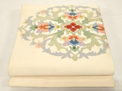 未使用品】袋帯 明綴れ織 宝相華 ベージュピンク お太鼓柄 - メルカリ