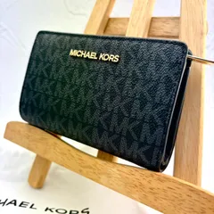 【未使用級】MICHAEL KORS/マイケルコース 二つ折り財布 シグネチャー PVC 総柄/MK柄 レディース