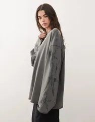 ウィークデイ レディース トップス Tシャツ Weekday oversized long sleeve Tshirt with rhinestone sleeve detail in offblack ブラック