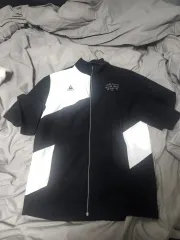 le coq sportif ウィンドブレーカー トップス