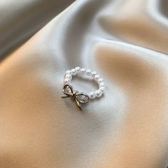 パールリング リボン シルバー 上品 韓国風 フリーサイズ 大人可愛い 指輪 レディース