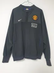 ナイキのフットボールクラブ ラインナップ マンチェスター・ユナイテッドFC AIG ブラック ジャケット M
