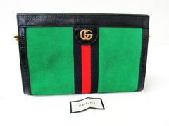 グッチGGロゴ付き緑スエードクラッチバッグ - メルカリ