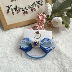 ハンドメイド リボン ヘアゴム インド刺繍 イルカブルー - メルカリ