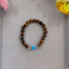 ハンドメイド／ブラウンビーズブレスレット   ブルーアクセント＆メタルパーツ入り