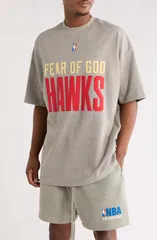 フィアオブゴッド メンズ トップス Tシャツ コットン グラフィック Fear of God Essentials Hawks 90s Cotton Graphic TShirt Dark Heather Oatmeal ヘザー