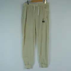 NIKE ベージュ ウーブン ジョガー パンツ