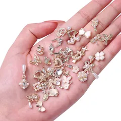 【数量限定】リボン 蝶々 花 パール 立体 ハート ネイルパーツ ストーン キラキラ ネイルパーツ 大きめ ネイルアート パーツ メタルパーツ 3D DIY ジュエリーパーツ 手芸 ハンドメイド 約50個セット デコパーツ ランダム形 (A)