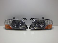 MITSUBISHI三菱 パジェロ 左右ヘッドライト 100-87419割れ無し - メルカリ