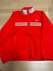 アディダス フリース ジャケット オレンジ