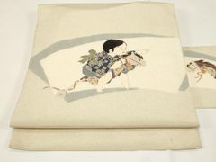 素敵な装い！西陣名古屋帯 綿芯仕立付 「鳥獣人物戯画」クリーム