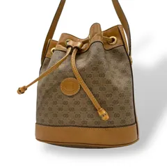 グッチ GUCCI ショルダーバッグ 巾着バッグ クロスボディ 斜め掛け可 マイクロGG オールドグッチ PVC レザー 本革 ブラウン 茶 ゴールド金具 ヴィンテージ ビンテージ クラシック エレガント 希少 レア 鞄 カバン レディース お出かけ A5