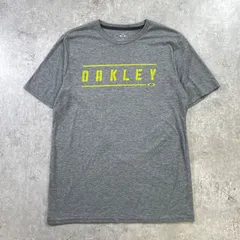 OAKLEY オークリー ワンポイントロゴ プリントTシャツ メンズM相当 古着 スポーツ 灰色