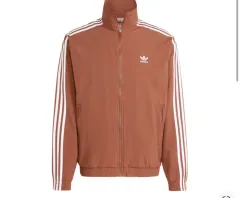 アディダス アディカラー ウーブン ファイヤーバード トラックジャージ ブラウン