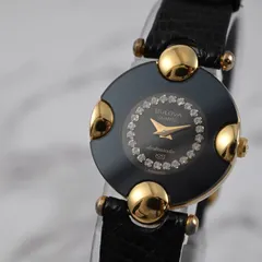 エレガントな煌めき✨BULOVA ブローバ クウォーツ レディース 腕時計 本革 レザーベルト ブラック 黒 ゴールド レザーベルト 【稼働品】のサムネイル